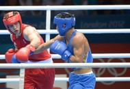 Egor Mekhontcev of Russia (in red) defends against of Adilbek Niyazymbetov of Kazakhstan